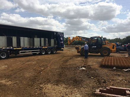 Cabinets being Unloaded.jpg